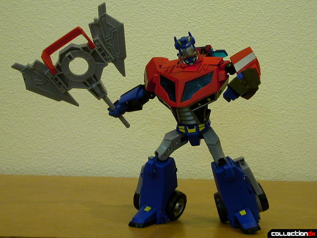 Autobot Optimus Prime- robot mode posed with Ion Ax (1)