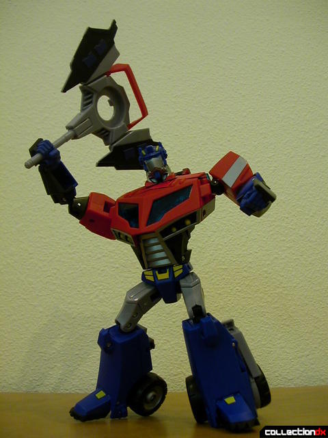 Autobot Optimus Prime- robot mode posed with Ion Ax (2)