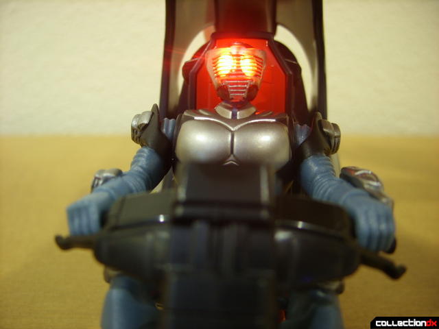 Kamen Rider Blank Knight with Advent Cycle (figure seated, eyes glowing)