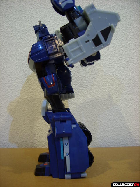 Animated Leader-class Autobot Ultra Magnus- robot mode (posture detail, left arm raised vertically)